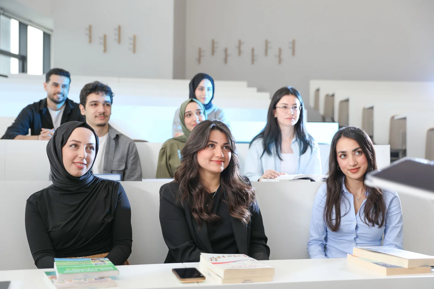 Students learning together in a university classroom